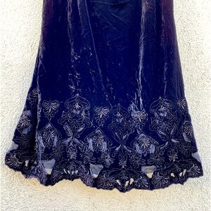 Tahari Dress, Black Velvet sleeveless, cut-out design, bottom of the dress.